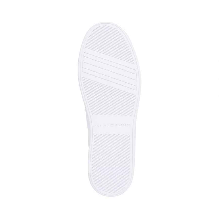 zapatillas-de-piel-con-monogramas-th