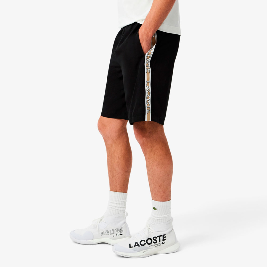 shorts-a-righe-con-logo-sportivo